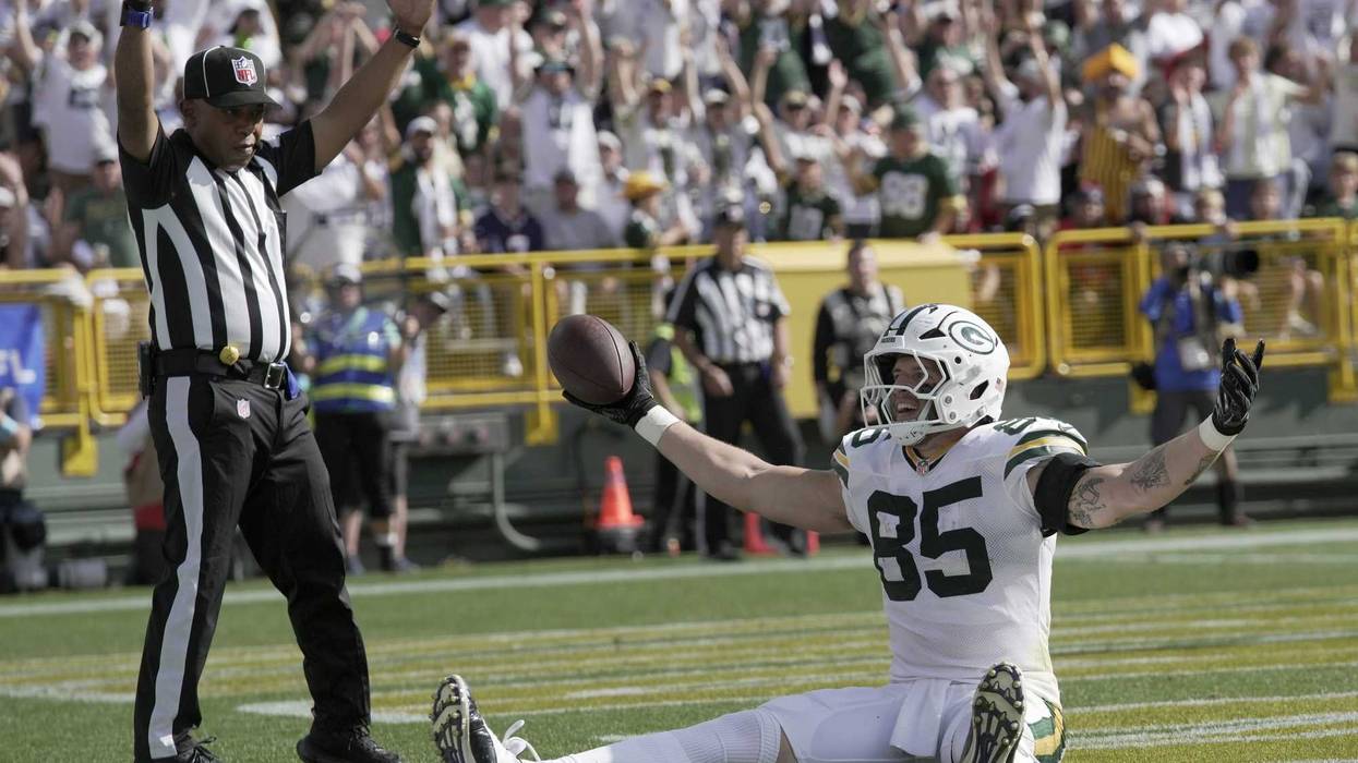 Oct 20, 2024; Green Bay, Wisconsin, USA; Green Bay Packers tight end Tucker Kraft (85) celebrates his touchdown reception during the second quarter of their game against the Houston Texans at Lambeau Field.
