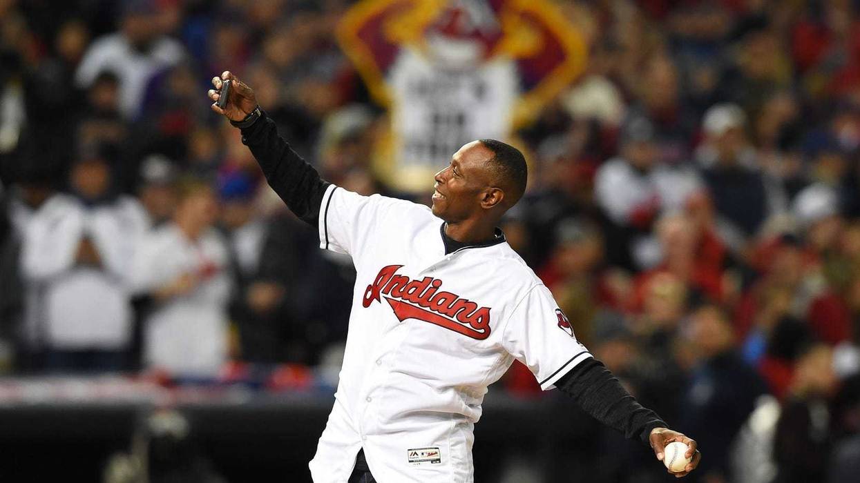 Oct 25, 2016; Cleveland, OH, USA; Cleveland Indians former player Kenny Lofton throws out the ceremonial first pitch before game one of the 2016 World Series against the Chicago Cubs at Progressive Field. Mandatory Credit: Tommy Gilligan-USA TODAY Sports