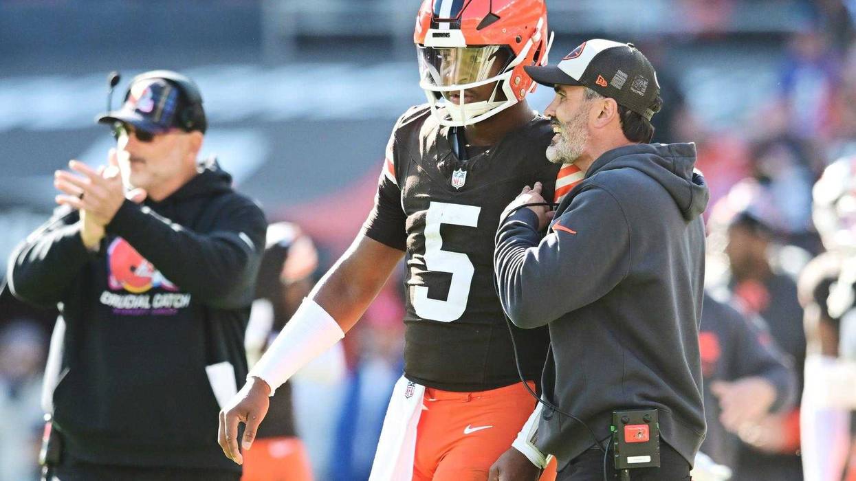 Oct 27, 2024; Cleveland, Ohio, USA; Cleveland Browns head coach Kevin Stefanski talks to quarterback Jameis Winston (5) during the second half against the Baltimore Ravens at Huntington Bank Field.