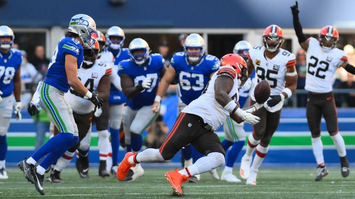Oct 29, 2023; Seattle, Washington, USA; Cleveland Browns defensive tackle Maurice Hurst II (90) intercepts the ball against the Cleveland Browns during the second half at Lumen Field. Mandatory Credit: Steven Bisig-USA TODAY Sports