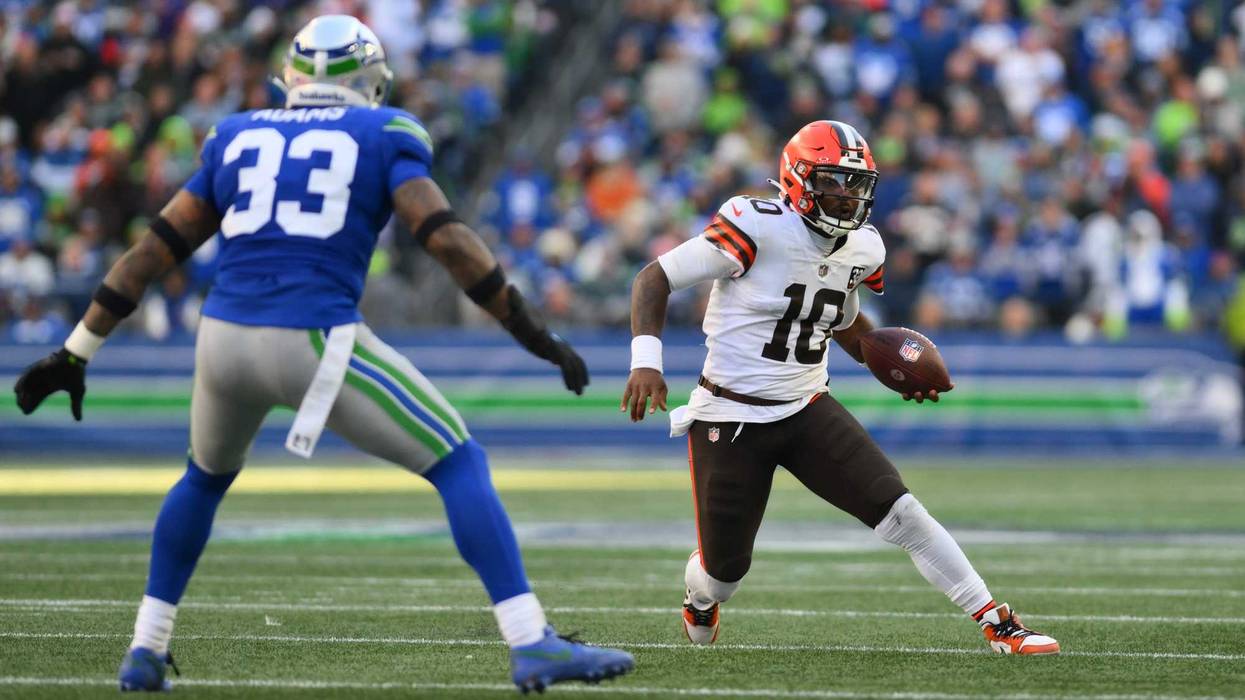 Oct 29, 2023; Seattle, Washington, USA; Cleveland Browns quarterback PJ Walker (10) carries the ball while defended by Seattle Seahawks safety Jamal Adams (33) during the second half at Lumen Field. Mandatory Credit: Steven Bisig-USA TODAY Sports