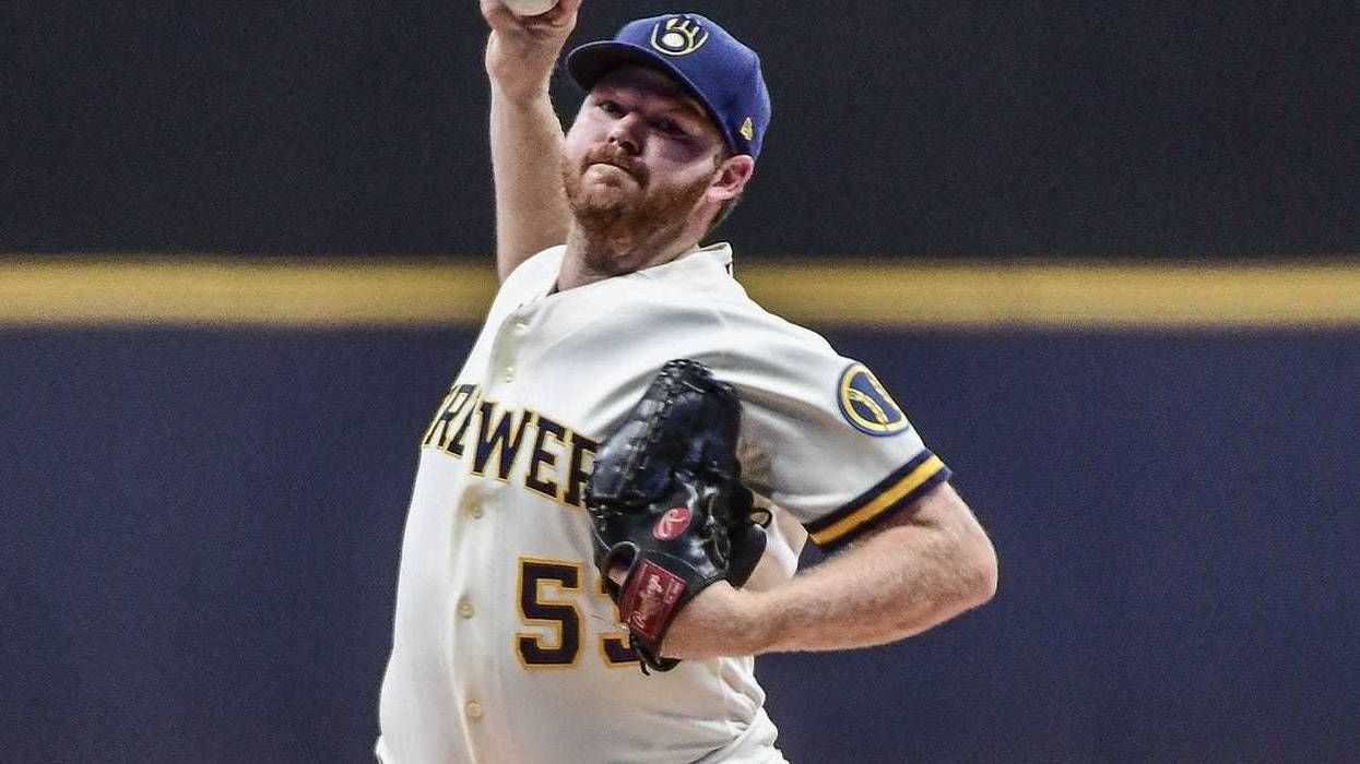 Oct 3, 2022; Milwaukee, Wisconsin, USA; Milwaukee Brewers pitcher Brandon Woodruff (53) throws a pitch in the first inning against the Arizona Diamondbacks at American Family Field. Mandatory Credit: Benny Sieu-Imagn Images