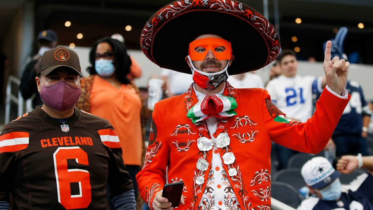 Oct 4, 2020; Arlington, Texas, USA; Cleveland Browns fans celebrate a wOct 4, 2020; Arlington, Texas, USA; Cleveland Browns fans celebrate a win against the Dallain against the Dallas Cowboys at AT&T Stadium. Mandatory Credit: Tim Heitman-USA TODAY Sports