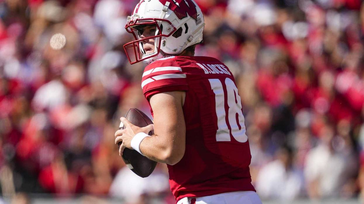 Oct 5, 2024; Madison, Wisconsin, USA; Wisconsin Badgers quarterback Braedyn Locke (18) looks to throw a pass during the third quarter against the Purdue Boilermakers at Camp Randall Stadium. Mandatory Credit: Jeff Hanisch-Imagn Images