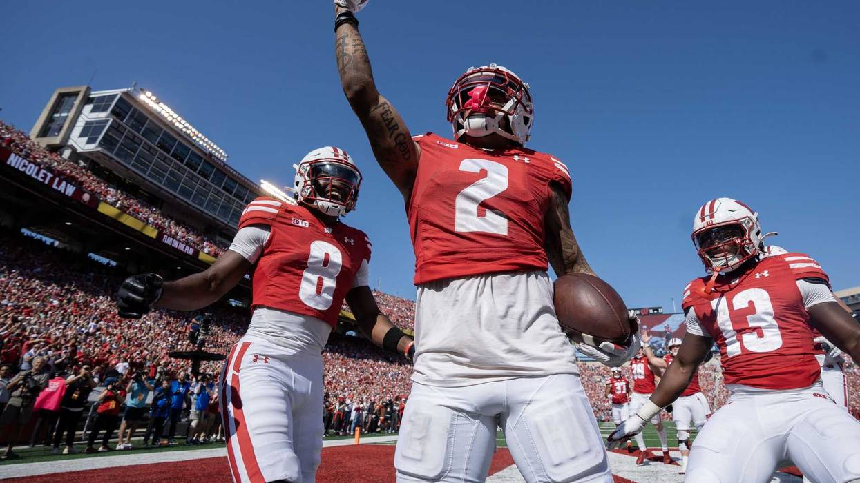 Oct 5, 2024; Madison, Wisconsin, USA; Wisconsin Badgers wide receiver Trech Kekahuna (2) celebrates after making a 25-yard touchdown reception against the Purdue Boilermakers during the third quarter at Camp Randall Stadium. Mandatory Credit: Mark Hoffman/USA TODAY Network via Imagn Images