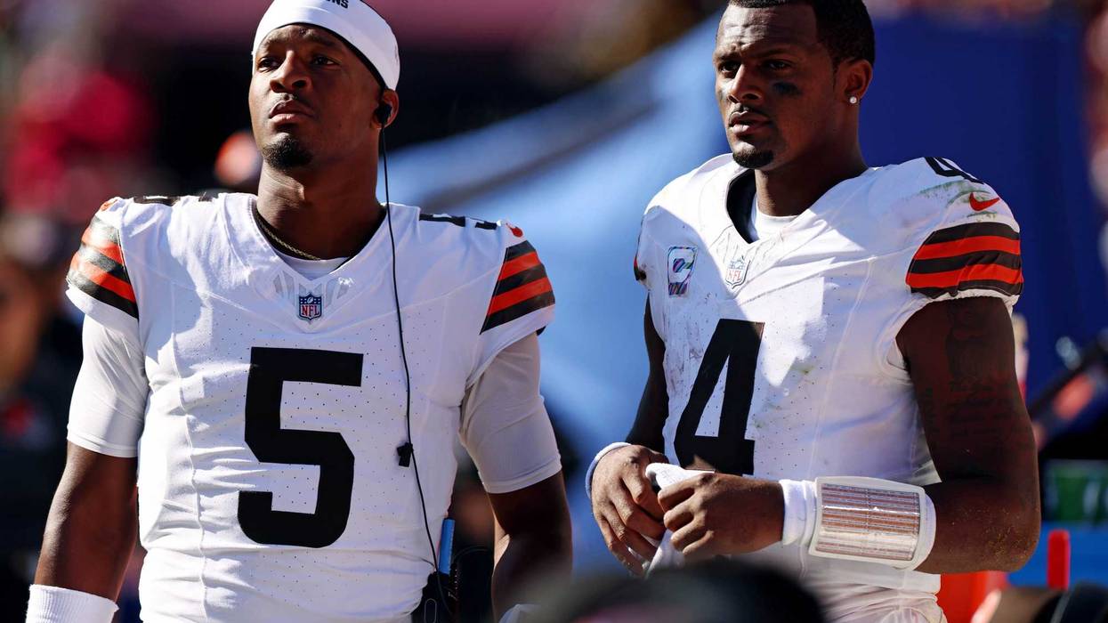 Oct 6, 2024; Landover, Maryland, USA; Cleveland Browns quarterback Deshaun Watson (4) and quarterback Jameis Winston (5) stand on the sideline during the fourth quarter of the game against the Washington Commanders at NorthWest Stadium.