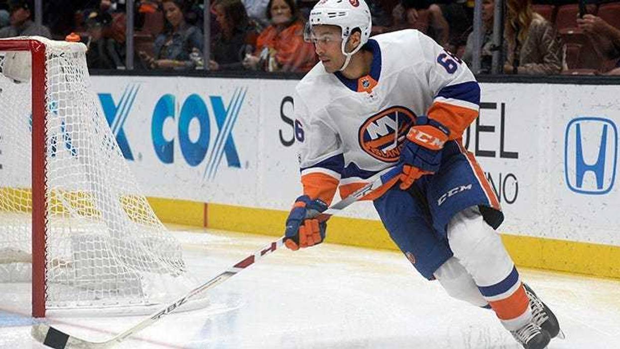 October 11, 2017; Anaheim, CA, USA; New York Islanders right wing Joshua Ho-Sang (66) moves the puck against the Anaheim Ducks during the second period at Honda Center. Mandatory Credit: Gary A. Vasquez-USA TODAY Sports