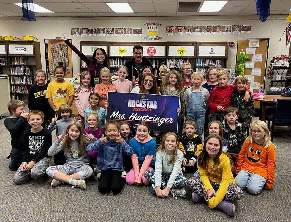 October Rockstar Teacher winner with class