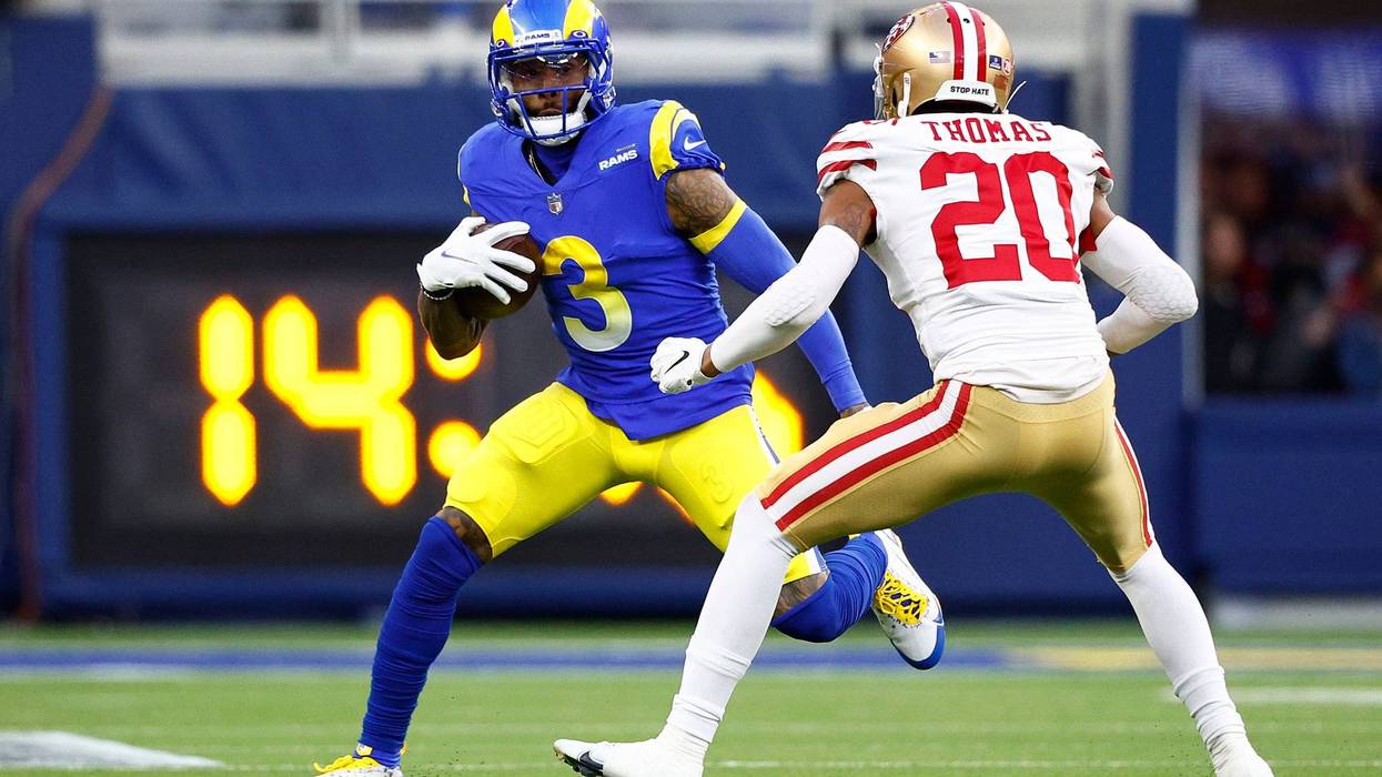 Odell Beckham Jr. #3 of the Los Angeles Rams runs with the ball as Ambry Thomas #20 of the San Francisco 49ers defends in the NFC Championship Game at SoFi Stadium on January 30, 2022, in Inglewood, California.
