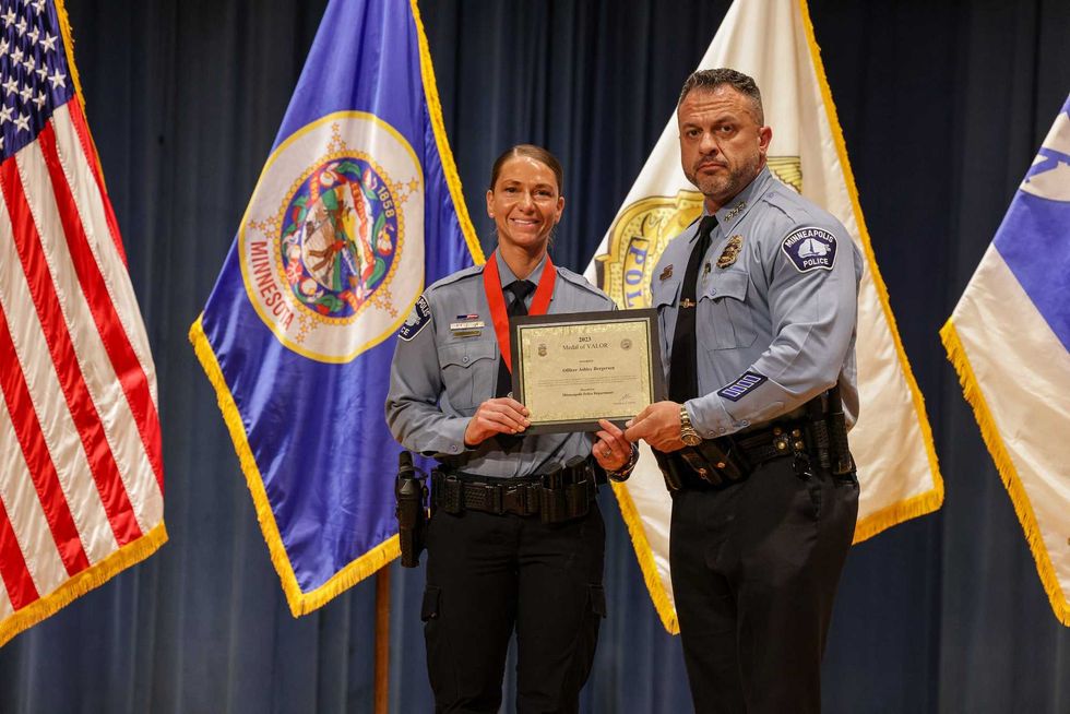 Officer Ashley Bergersen and Minneapolis Police Chief Brian O