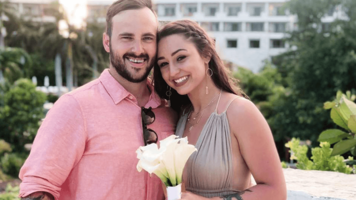 Officer Sean Sluganski with his fiancee'