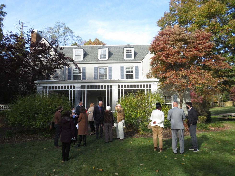 Officials attend a ribbon-cutting for the new Quality Parenting Center at The Village for Families & Children, Manchester, CT, 11/4/21