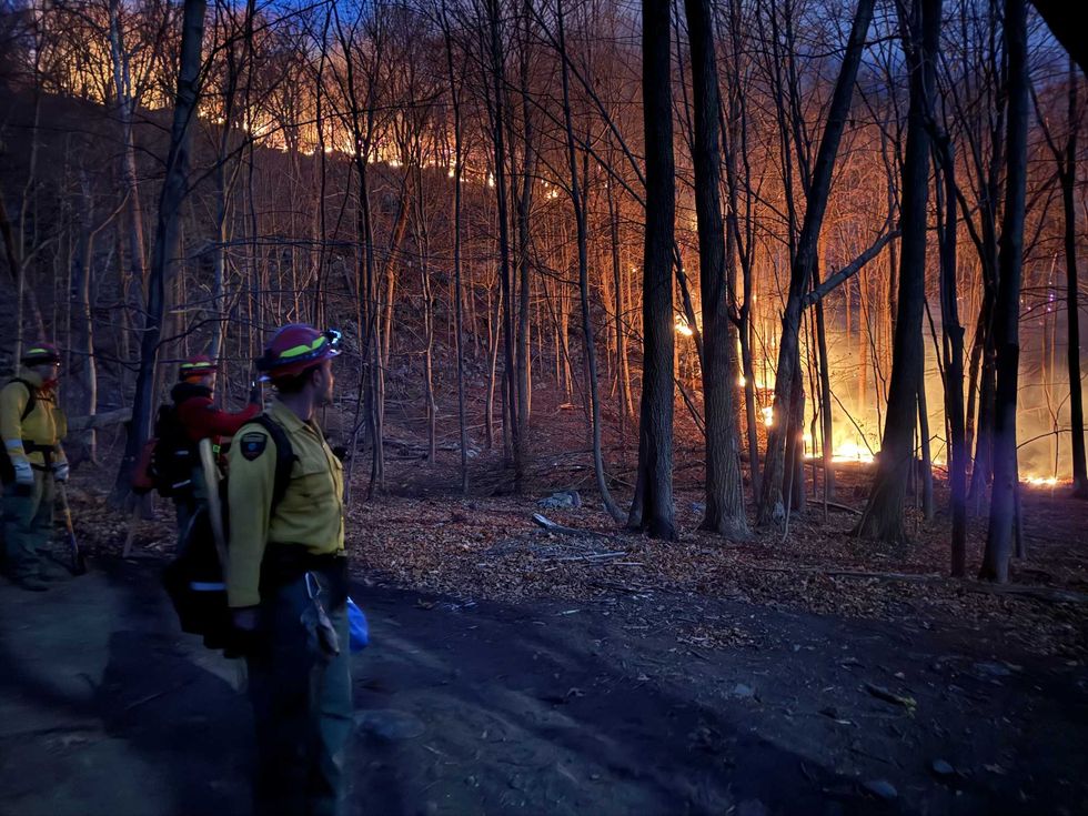 Officials respond to the Jennings Creek wildfire in New York on Saturday, Nov. 16.