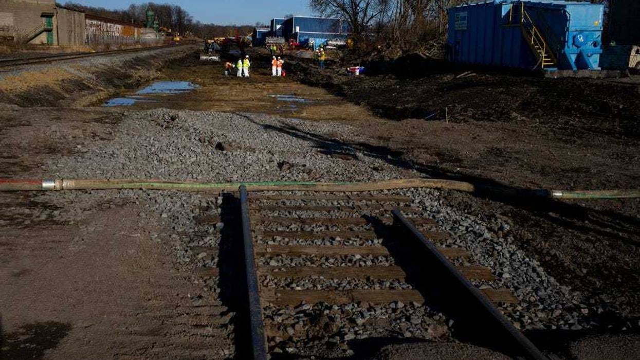 Ohio EPA and EPA contractors collect soil and air samples from the derailment site on March 9, 2023 in East Palestine, Ohio. Cleanup efforts continue after a Norfolk Southern train carrying toxic chemicals derailed causing an environmental disaster. Thousands of residents were ordered to evacuate after the area was placed under a state of emergency and temporary evacuation orders. (Photo by Michael Swensen/Getty Images)