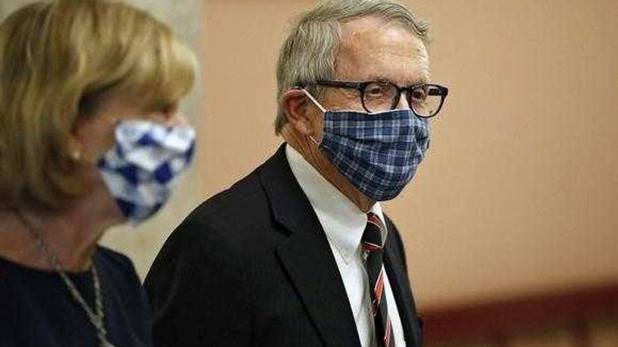 Ohio Gov. Mike DeWine and First Lady Fran DeWine leave the State Room after giving an update on the state's response to the ongoing COVID-19 pandemic Tuesday, April 10, at the Ohio Statehouse. Dewine Facemask