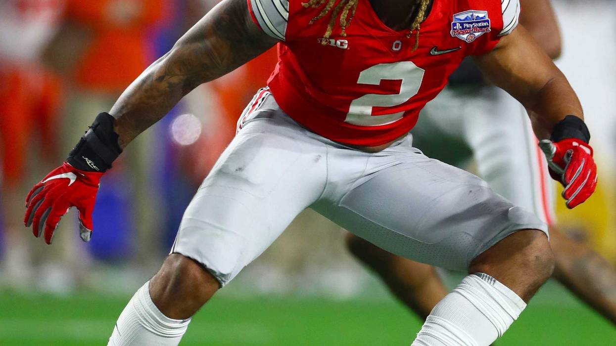 Ohio State Buckeyes defensive end Chase Young (2) rushes the passer against Clemson Tigers tackle Jackson Carman (79) in the 2019 Fiesta Bowl college football playoff semifinal game.