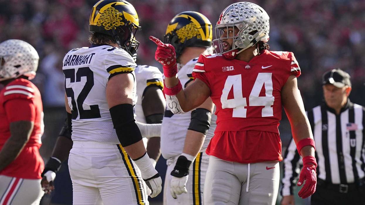 Ohio State Buckeyes defensive end J.T. Tuimoloau (44) reacts between plays in the 2022 matchup between Ohio State and Michigan.
