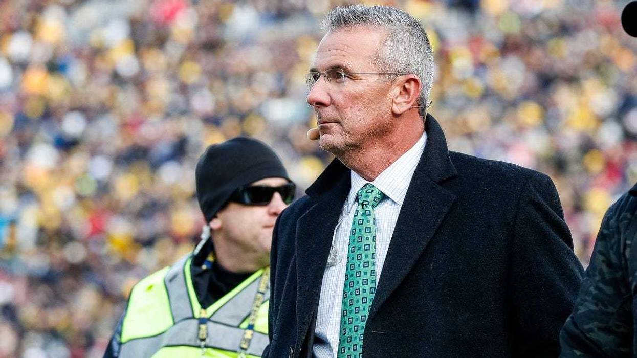 Ohio State Buckeyes former head coach Urban Meyer walks by the end zone during the first half between Michigan and Ohio State at Michigan Stadium in Ann Arbor on Saturday, Nov. 25, 2023.