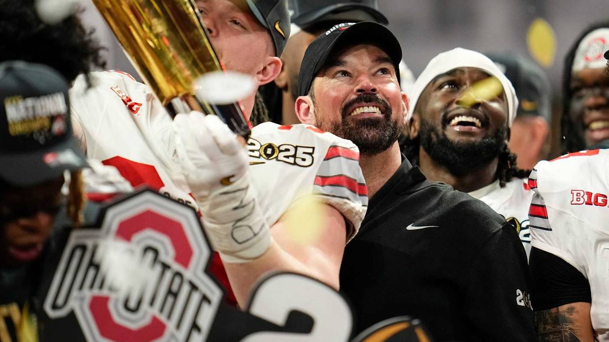 Ohio State Buckeyes head coach Ryan Day celebrates during the trophy ceremony following the 34-23 win over the Notre Dame Fighting Irish to win the College Football Playoff National Championship at Mercedes-Benz Stadium in Atlanta on Jan. 21, 2025.
