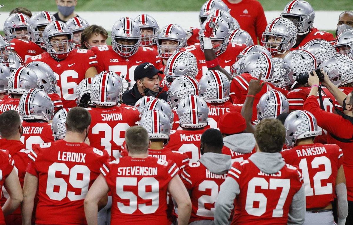 Ohio State Buckeyes head coach Ryan Day fires up his team during warm-ups prior to the Big Ten Championship football game against the Northwestern Wildcats at Lucas Oil Stadium in Indianapolis on Saturday, Dec. 19, 2020.