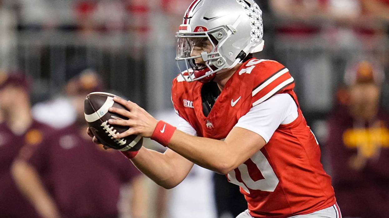 Ohio State Buckeyes quarterback Julian Sayin (10) takes a snap during the second half of the NCAA football game against the Minnesota Golden Gophers at Ohio Stadium in Columbus on Oct. 4, 2025. Ohio State won 42-3.