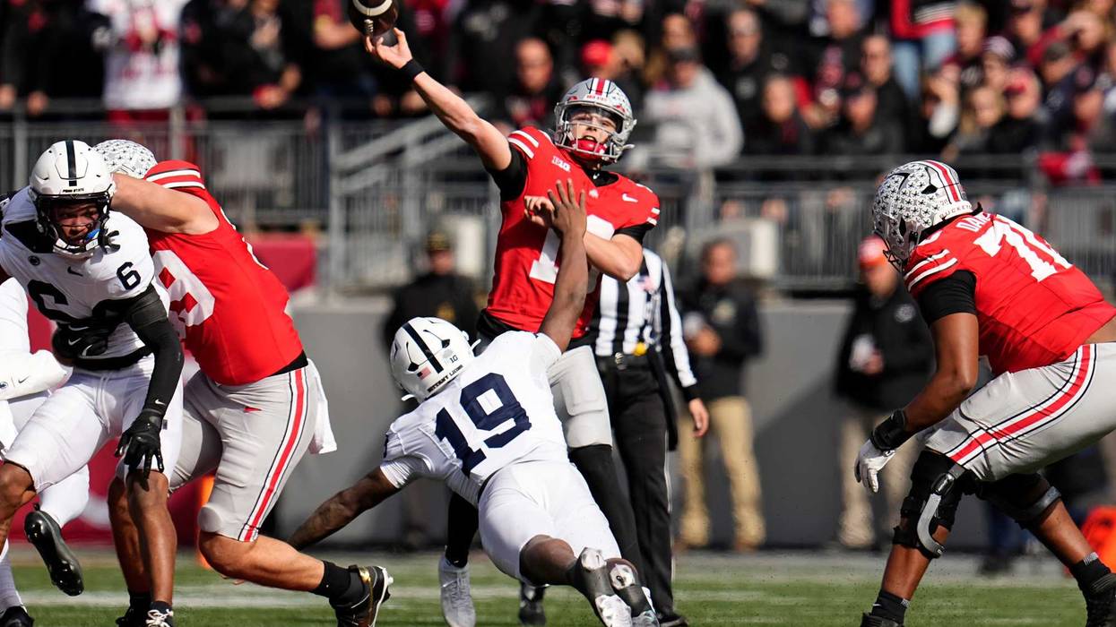 Ohio State Buckeyes quarterback Julian Sayin (10) throws a long touchdown pass to Carnell Tate during the NCAA football game against the Penn State Nittany Lions at Ohio Stadium in Columbus on Nov. 1, 2025.