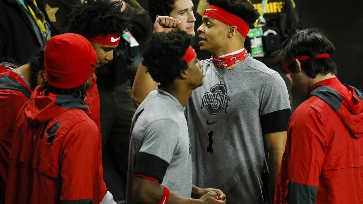 Ohio State Buckeyes quarterback Justin Fields (1) prepares for warmups before the start of the Big Ten Championship football game between the Ohio State Buckeyes and the Northwestern Wildcats on Saturday, Dec. 19, 2020 at Lucas Oil Stadium in Indianapolis.