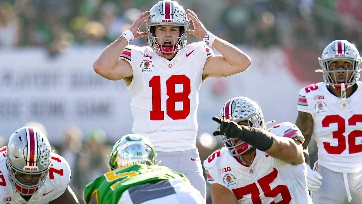 Ohio State Buckeyes quarterback Will Howard (18) motions at the line of scrimmage during the College Football Playoff quarterfinal against the Oregon Ducks at the Rose Bowl in Pasadena, Calif. on Jan. 1, 2025. Ohio State won 41-21.