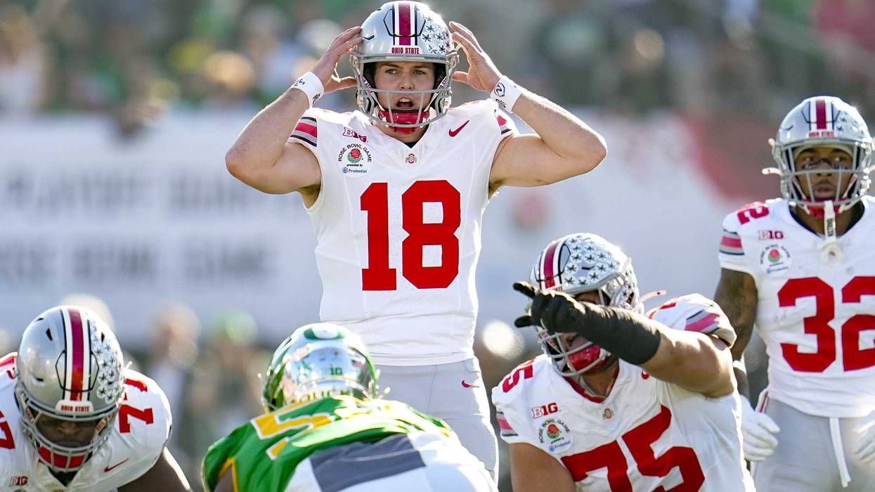 Ohio State Buckeyes quarterback Will Howard (18) motions at the line of scrimmage during the College Football Playoff quarterfinal against the Oregon Ducks at the Rose Bowl in Pasadena, Calif. on Jan. 1, 2025. Ohio State won 41-21.