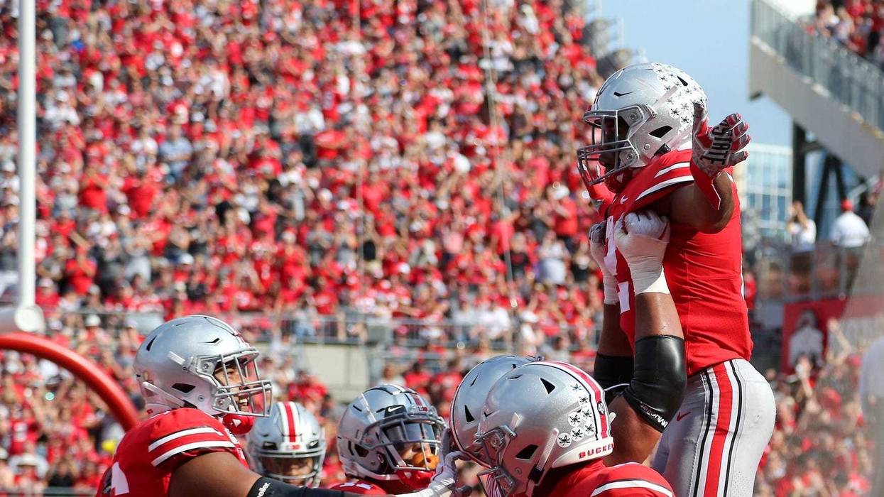 Ohio State Buckeyes running back J.K. Dobbins (2) celebrates after scoring a touchdown against the Miami (Oh) Redhawks during the second quarter at Ohio Stadium.