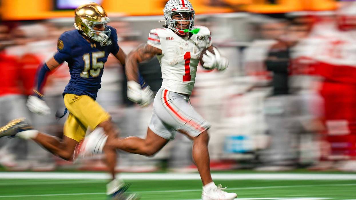 Ohio State Buckeyes running back Quinshon Judkins (1) gets away from the Notre Dame Fighting Irish defense for a long run in the third quarter during the College Football Playoff championship at Mercedes-Benz Stadium in Atlanta on January 20, 2025.