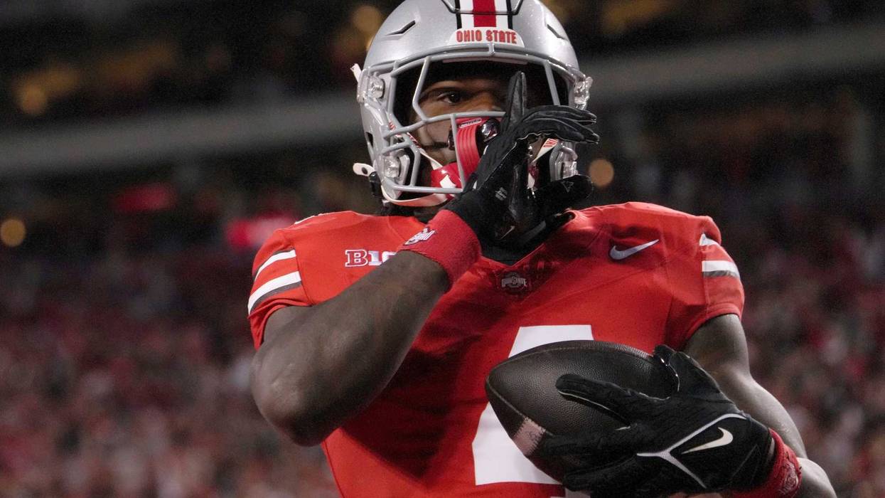 Ohio State Buckeyes wide receiver Jeremiah Smith (4) celebrates after scoring a touchdown during the first half of an NCAA Division I football game on Saturday at Ohio Stadium.