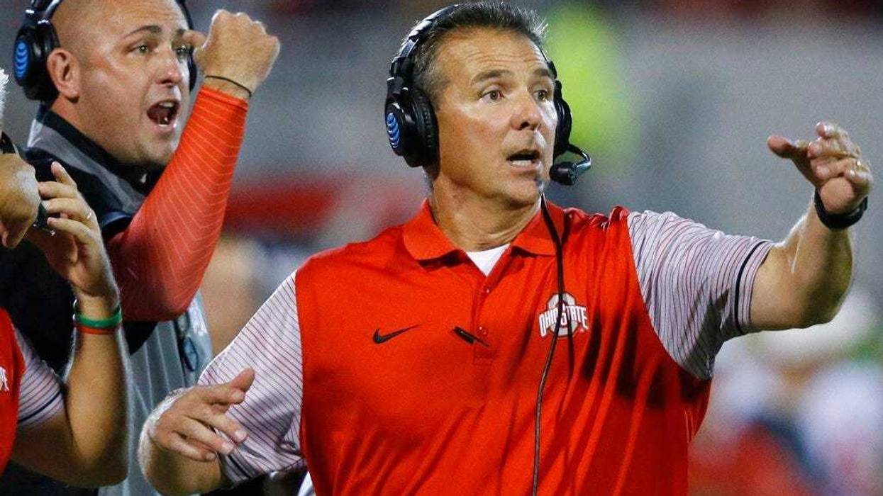 Ohio State coach Urban Meyer, right, and assistant coach Zach Smith, left