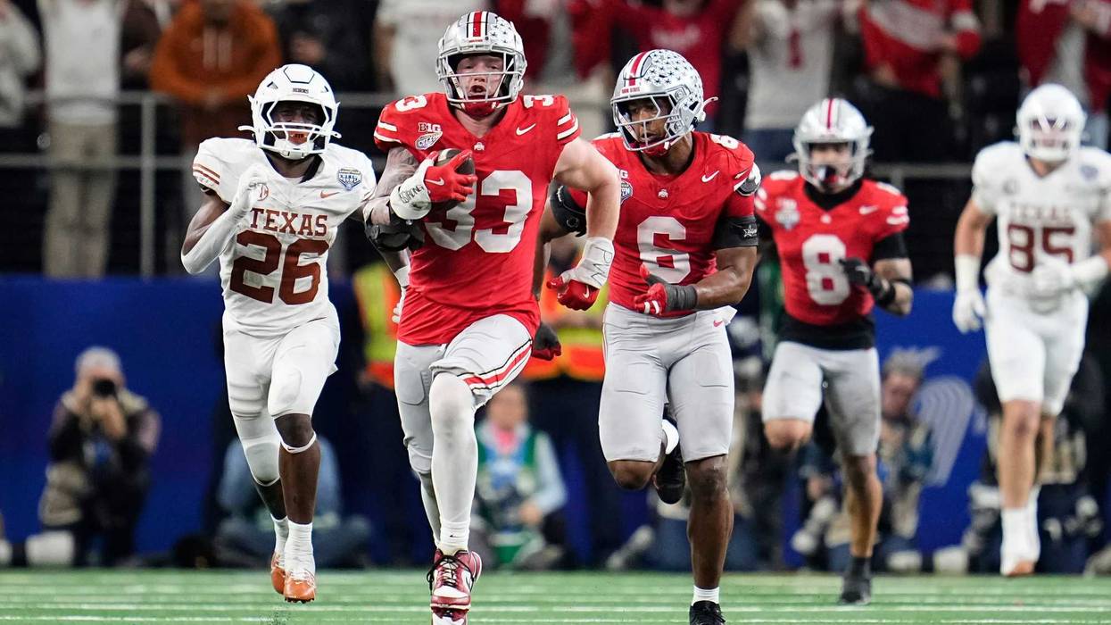 Ohio State defensive end Jack Sawyer (33) returns a fumble recovery for a touchdown against Texas during the 2025 Cotton Bowl at AT&T Stadium in Arlington, Texas.