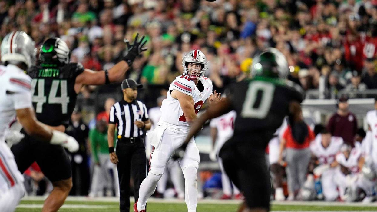 Ohio State quarterback Will Howard passes against Oregon on Saturday.