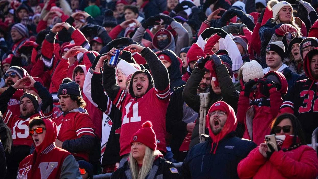 Ohio State students in the Block O section cheer on the Buckeyes during the NCAA football game against the Michigan Wolverines at Ohio Stadium in Columbus on Tuesday, Dec. 3, 2024.
