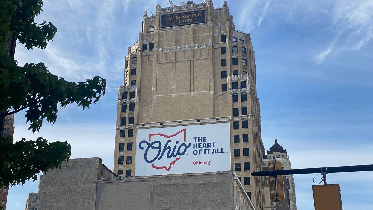 Ohio tourism sign on Louis Kamper Building in downtown Detroit