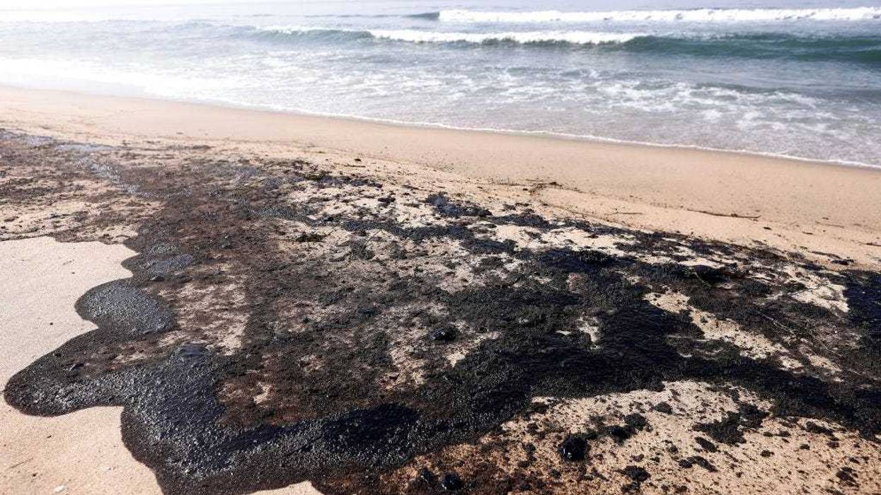 Oil is washed up on Huntington State Beach after a 126,000-gallon oil spill from an offshore oil platform on October 3, 2021 in Huntington Beach, California.