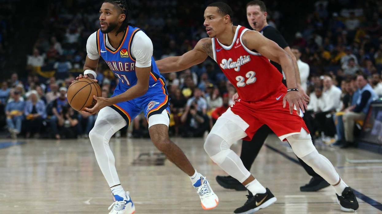 Oklahoma City Thunder guard Isaiah Joe (11) drives to the basket as Memphis Grizzlies guard Desmond Bane (22) defends during the fourth quarter during game four for the first round of the 2024 NBA Playoffs at FedExForum.