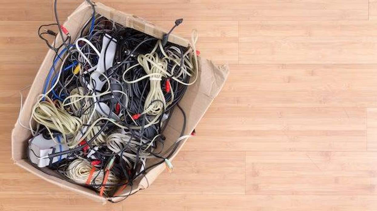 Old battered box with electrical cords