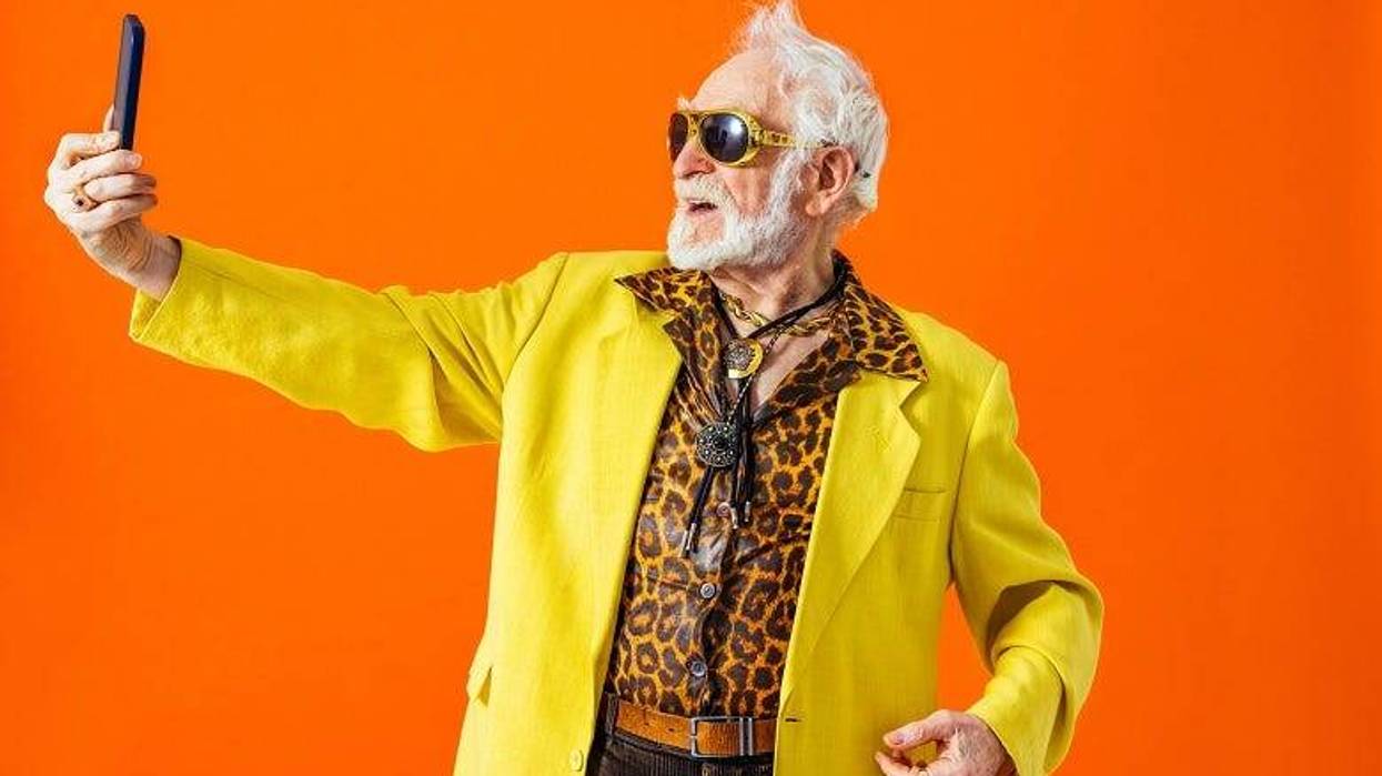 old man shooting a selfie