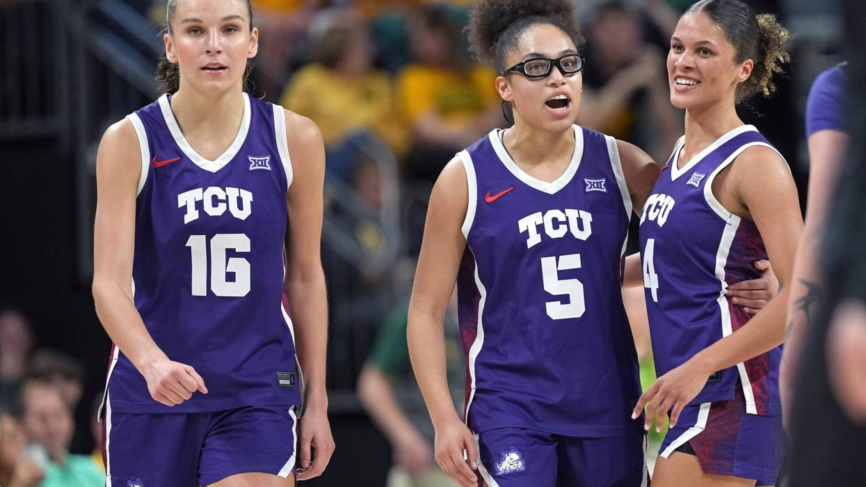 Olivia Miles #5 of the TCU Horned Frogs reacts along with teammates Clara Bielefeld #16 and Donovyn Hunter #4 during the second half against the Baylor Bears at Foster Pavilion on February 12, 2026 in Waco, Texas.