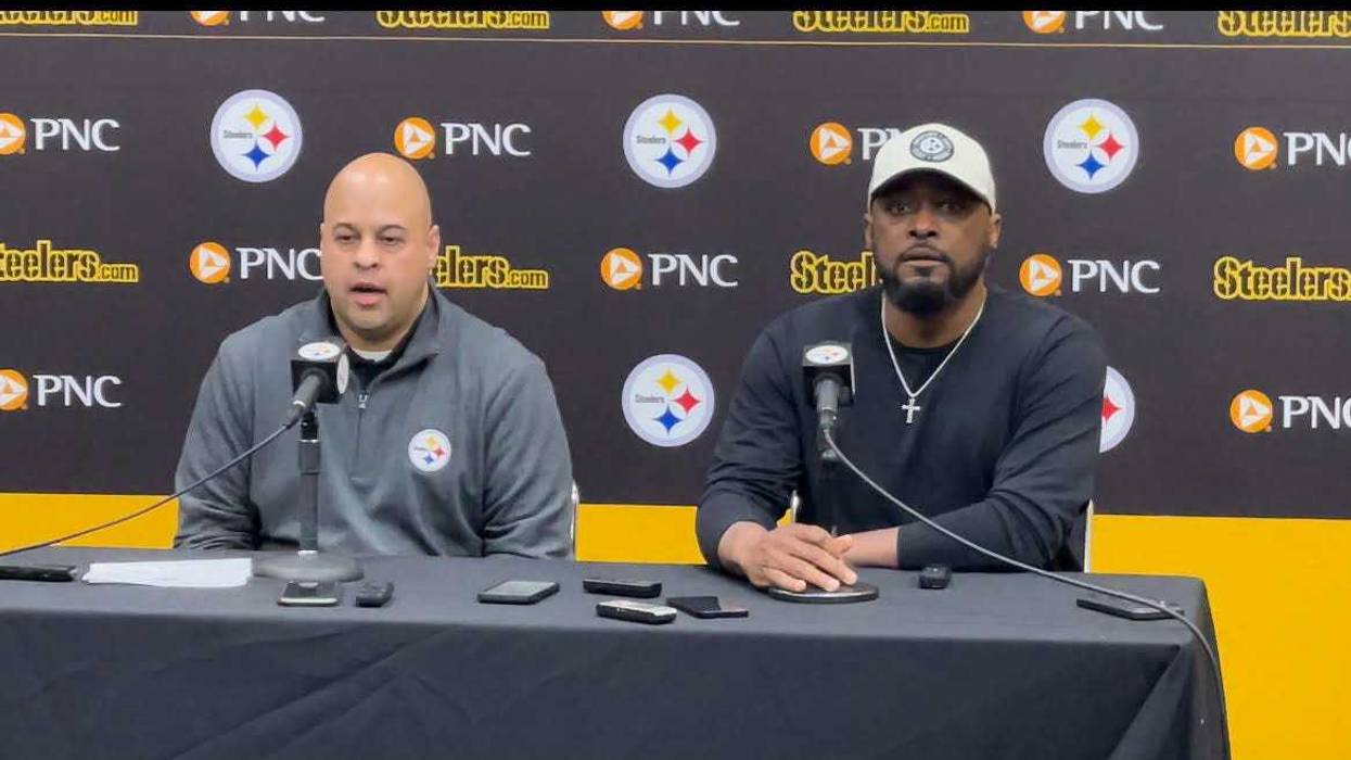 Omar Khan and Mike Tomlin at podium