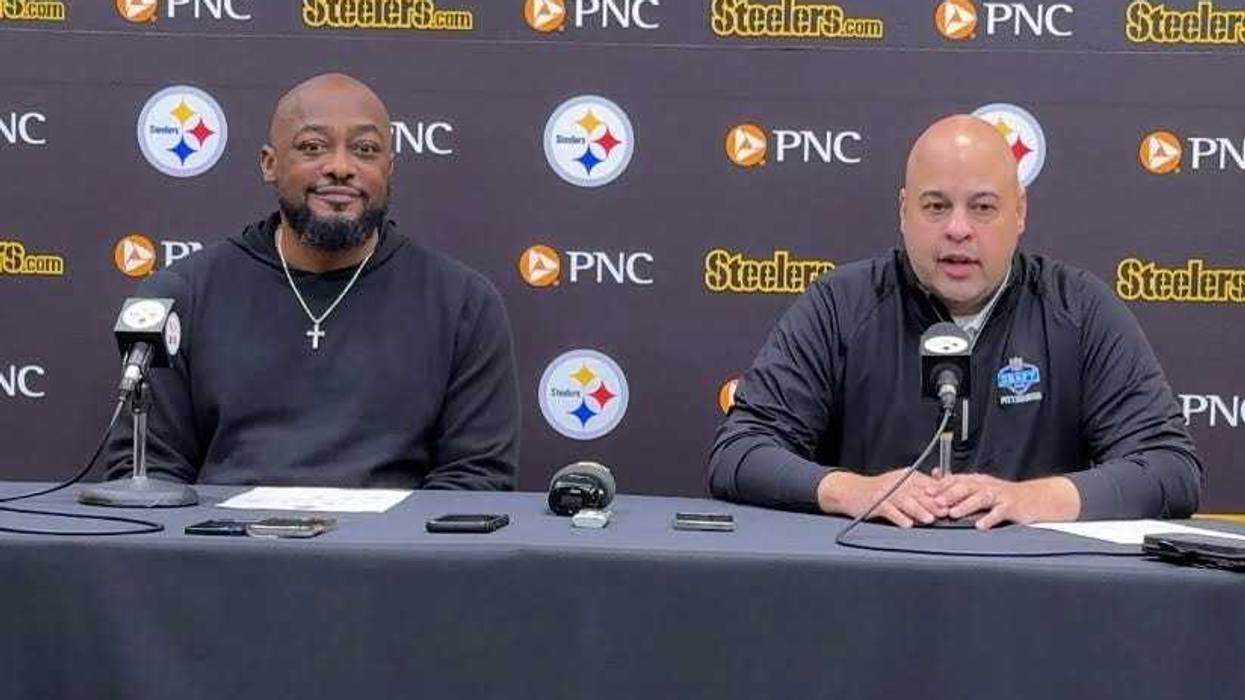 Omar Khan Mike Tomlin at table