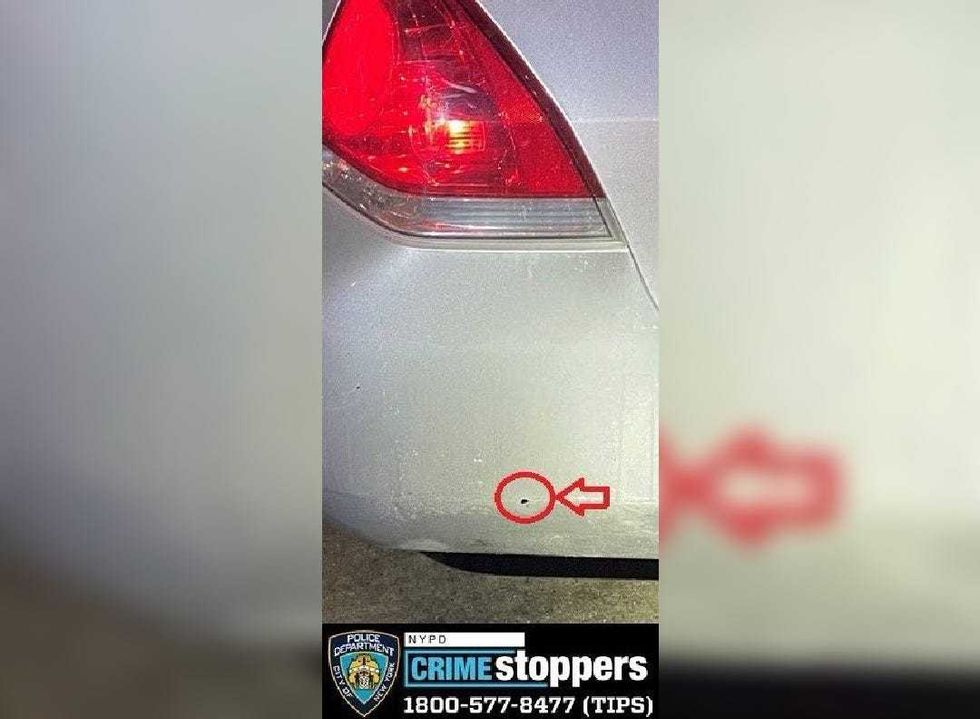 One bullet fired by a suspect struck the rear bumper of an unmarked vehicle, police said