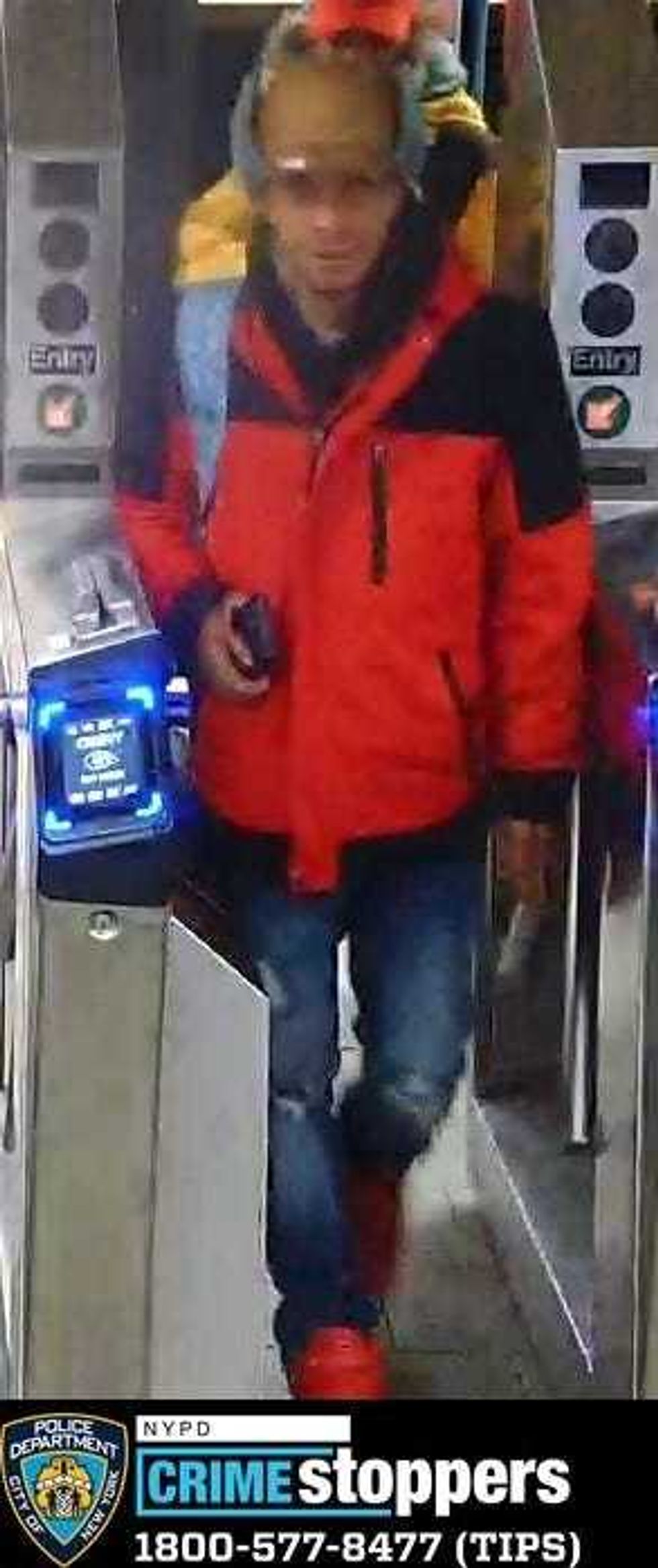 One of 11 suspects wanted in back-to-back robberies at the North Face store in SoHo last month.