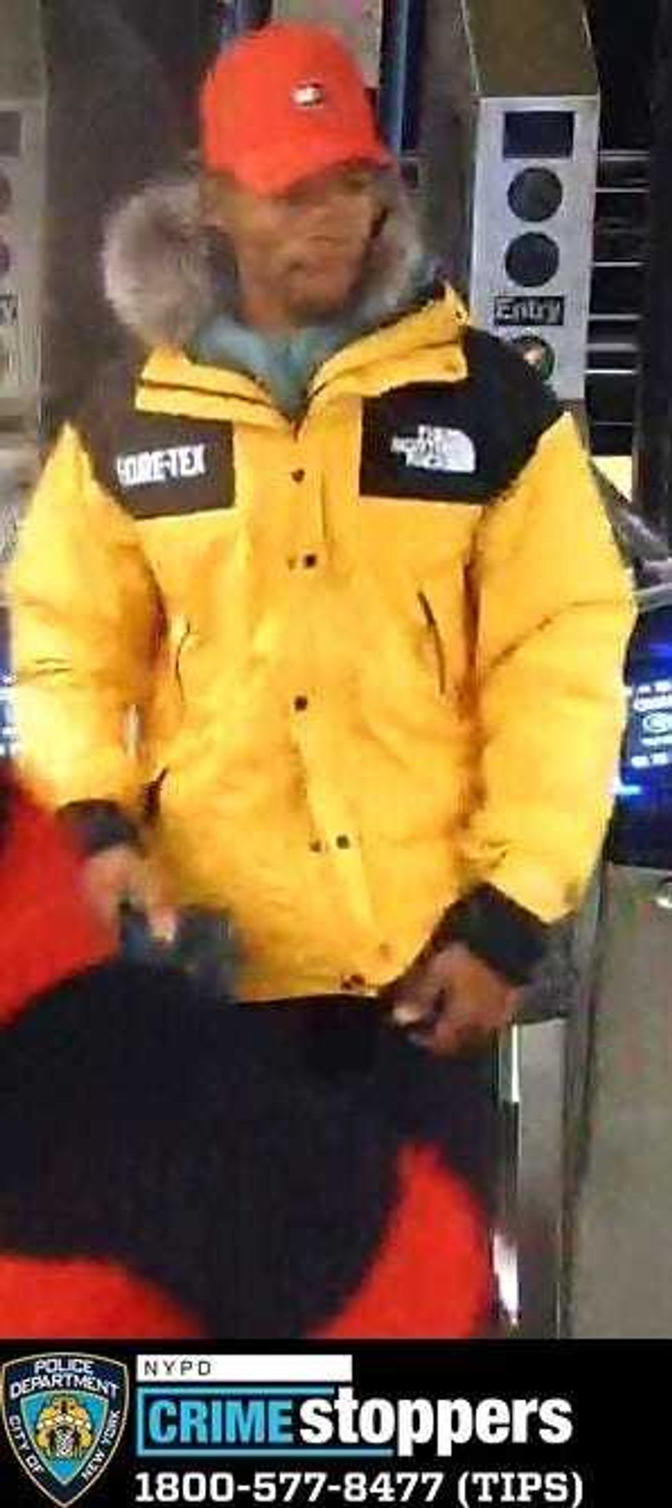 One of 11 suspects wanted in back-to-back robberies at the North Face store in SoHo last month.