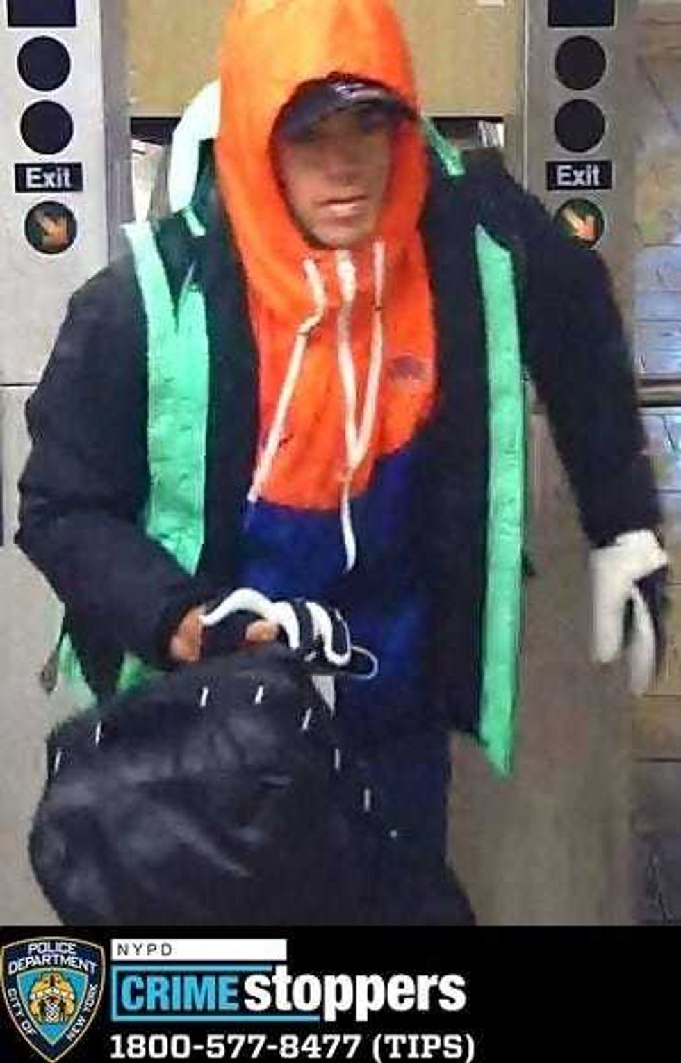 One of 11 suspects wanted in back-to-back robberies at the North Face store in SoHo last month.