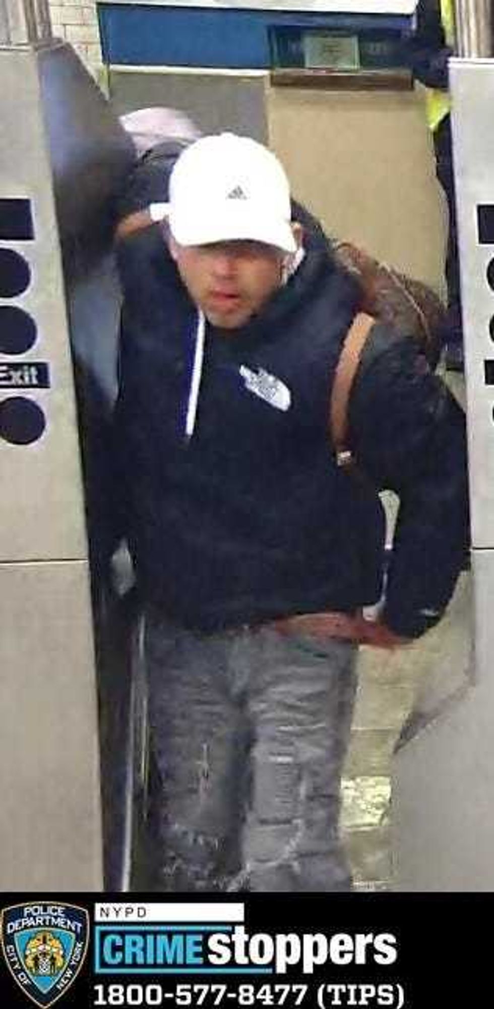 One of 11 suspects wanted in back-to-back robberies at the North Face store in SoHo last month.
