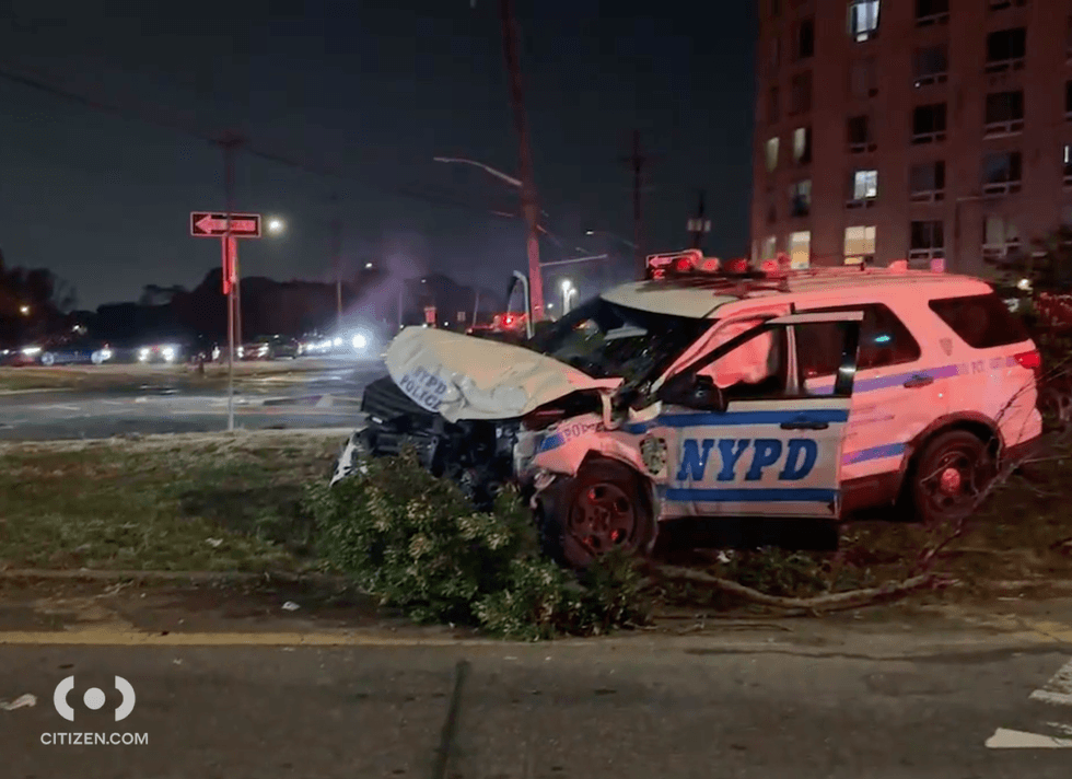 One of the police vehicles was smoking after the crash